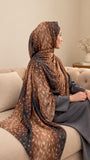 AYNN ALIF mocha deer print modal lawn hijab in brown, caramel beige and charcoal tones styled with a grey outfit.