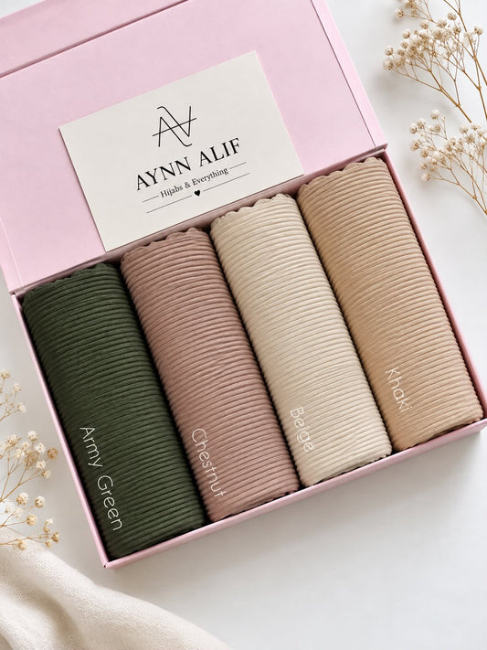 Earthy Elegance Ribbed Jersey Hijab Box featuring Olive Green, Nude Blush, Sand Beige and Warm Beige premium anti-slip narrow ribbed jersey hijabs in a luxury gift box.
