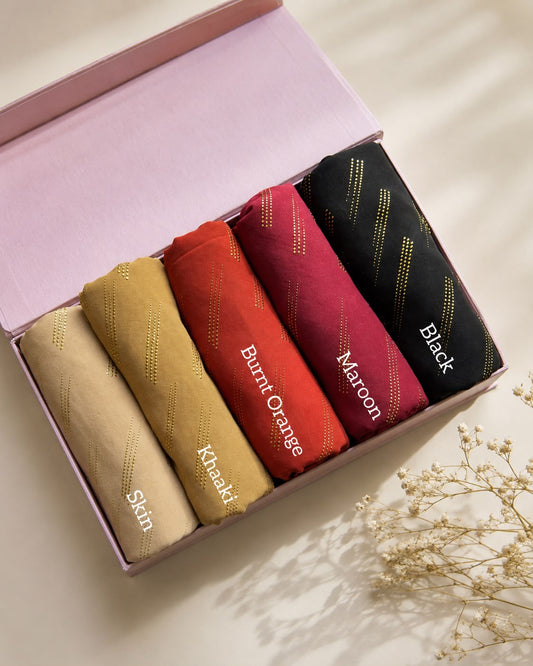Aynn Alif Golden Dust Chiffon Georgette Hijab with golden embossed texture in Skin, Khaaki, Burnt Orange, Maroon and Black premium chiffon hijab colours.