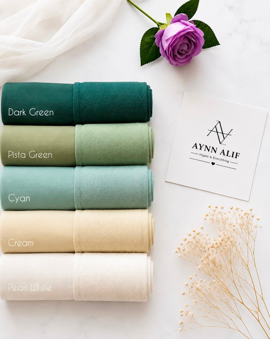 Aynn Alif Dark Green, Pista Green, Cyan, Cream and Pearl White chiffon georgette hijabs with matching plain jersey tube bands.