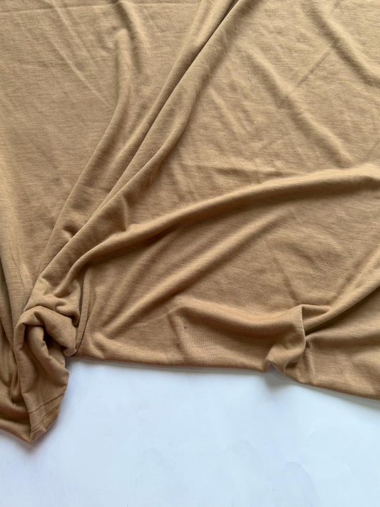 Light Brown Plain Jersey Hijab with a minor stain, made from soft stretch jersey fabric and offered at a discounted clearance price.