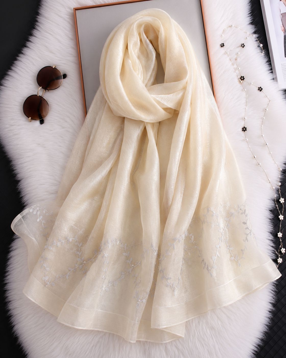 Light skin cotton silk hijab with embroidered organza border and pearl embellishments.