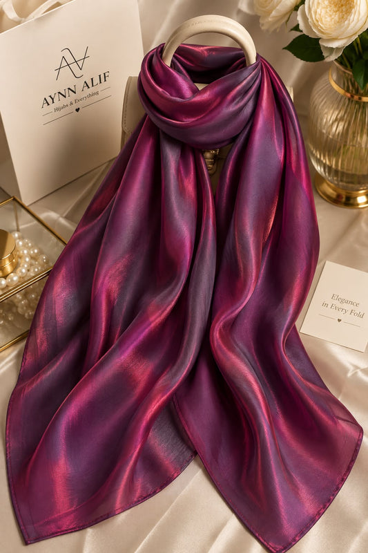 Magenta and charcoal grey double tone sheen silk scarf with a luxurious glossy finish and elegant flowy drape by Aynn Alif.