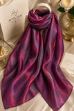 Magenta and charcoal grey double tone sheen silk scarf with a luxurious glossy finish and elegant flowy drape by Aynn Alif.