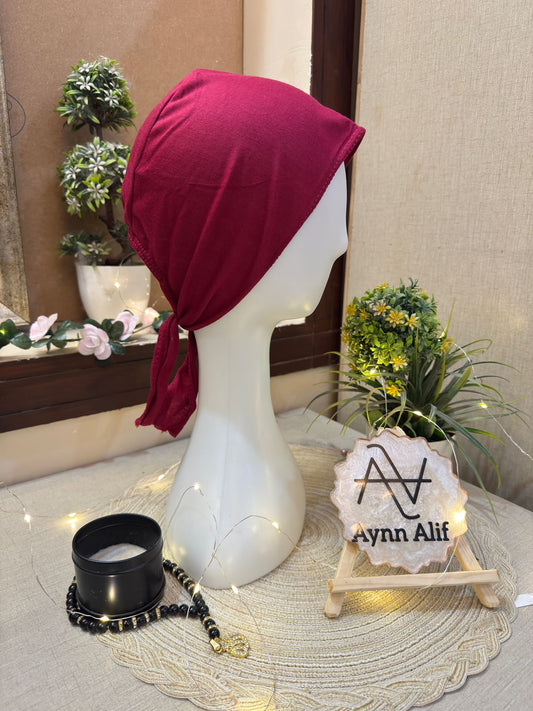 Maroonish red hijab underscarf cap side view mannequin