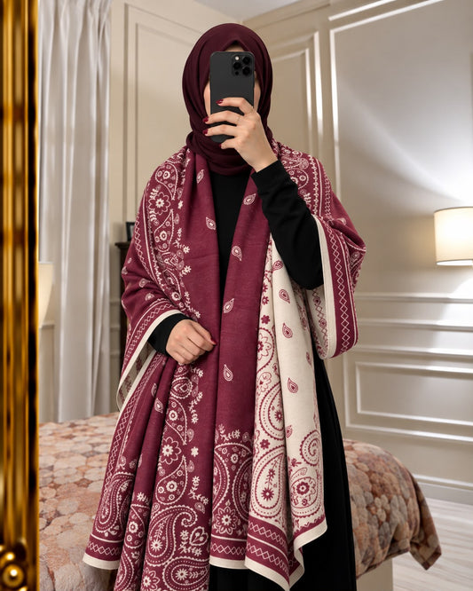 Maroon and ivory paisley reversible woolen wrap styled over a black modest outfit