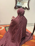 Maroon namaz chaadar with beige rings by Aynn Alif Pakistan featuring elastic sleeves, elastic headband, wudu-friendly design, breathable fabric, and full coverage prayer wear for women.