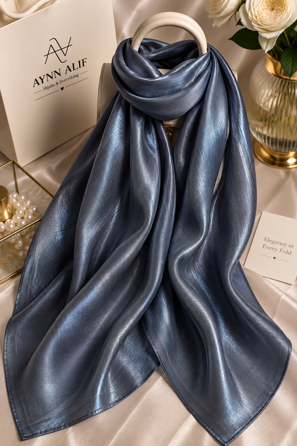 Midnight blue double tone sheen silk scarf with a luminous finish, smooth texture and elegant flowy drape by Aynn Alif.