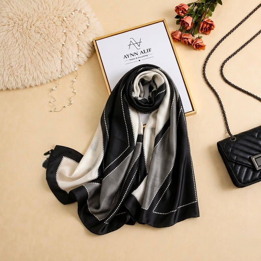 Black, ivory and grey printed silk scarf with delicate dotted line details by Aynn Alif