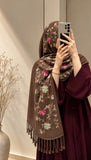 Mocha brown cashmere embroidered hijab featuring colourful floral embroidery, delicate sequin embellishments, and matching fringed edges by Aynn Alif.