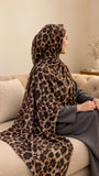 AYNN ALIF mocha leopard print modal lawn hijab in caramel beige and chocolate brown styled with a charcoal grey outfit.