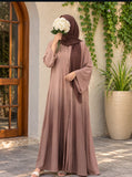 Mocha rose ombre front open abaya in Silk Korean Nidah with straight sleeves and matching scarf, styled with a brown hijab in an elegant outdoor setting.