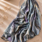 Aynn Alif Moonstone Marble Modal Lawn Hijab in misty blue, charcoal grey, lavender and gold marble print, extra large, breathable and soft.