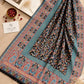 Aynn Alif Kashmiri Kani mini shawl featuring a midnight black base, teal blue, coral pink and peach floral motifs, intricate paisley borders, and decorative patterns.