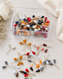Multi color loop glider pins for hijab and scarves in assorted shades with teardrop pearl heads and metal loops.
Snag-free, secure and stylish.