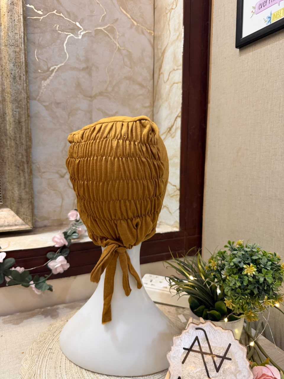 Mustard Yellow ruched tie back hijab cap made from soft breathable jersey with full head coverage and adjustable tie-back by Aynn Alif.