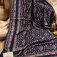 Navy blue Kashmiri Kani shawl with blush pink and beige paisley floral patterns and decorative borders by Aynn Alif Pakistan