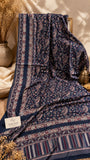 Navy blue Kashmiri Kani shawl with blush pink and beige paisley floral patterns and decorative borders by Aynn Alif Pakistan