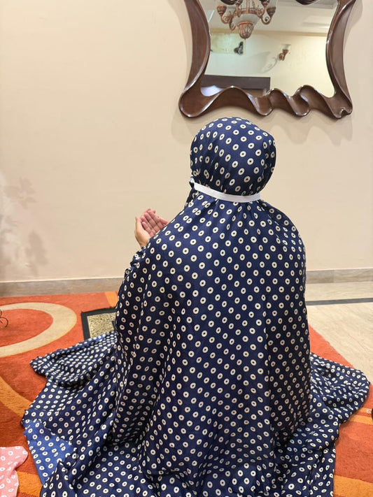 Navy blue namaz chaadar with beige rings by Aynn Alif Pakistan featuring elastic sleeves, elastic headband, wudu-friendly design, breathable fabric, and full coverage prayer wear for women.