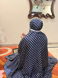 Navy blue namaz chaadar with beige rings by Aynn Alif Pakistan featuring elastic sleeves, elastic headband, wudu-friendly design, breathable fabric, and full coverage prayer wear for women.
