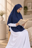 A young girl wearing a navy blue Aynn Alif teens jersey makhna scarf with an adjustable fit, designed for girls aged 11–16 years.