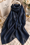 Midnight navy double tone sheen silk scarf with a luminous finish, smooth texture and elegant flowy drape by Aynn Alif.