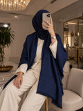 Midnight navy blue monogram-inspired pashmina wrap with tonal detailing, border and fringed edges styled for elegant winter layering.