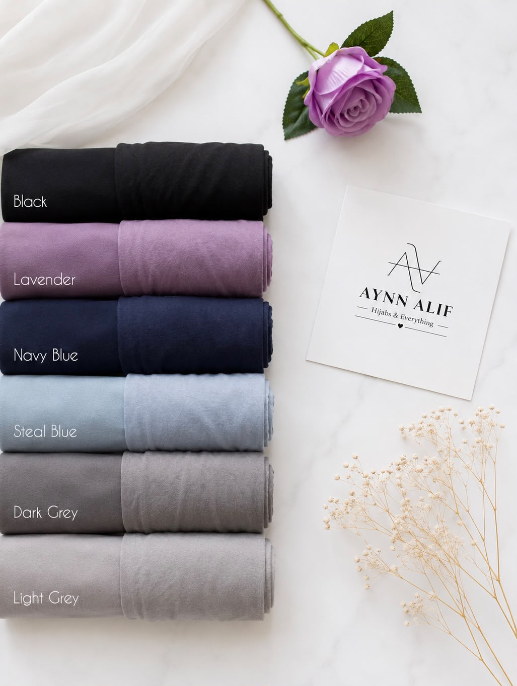 
Aynn Alif chiffon georgette hijabs with matching jersey tube bands in Black, Lavender, Navy Blue, Steal Blue, Dark Grey and Light Grey.