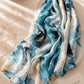 Aynn Alif Ocean Marble printed modal lawn hijab in sky blue, ivory white and gold abstract marble pattern, extra-large breathable scarf.