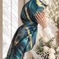 Aynn Alif Oceanic Gold printed sheen silk hijab in teal, turquoise and navy blue with gold abstract detailing