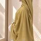 Olive green modal hijab by Aynn Alif featuring extremely soft, breathable fabric, an extra-large size and an elegant drape.