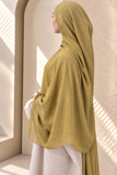 Olive green modal hijab by Aynn Alif featuring extremely soft, breathable fabric, an extra-large size and an elegant drape.
