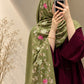 Olive green cashmere embroidered hijab featuring pink and ivory floral embroidery, delicate sequin embellishments, and matching fringed edges by Aynn Alif.
