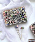 Pastel hijab pins box of 100 by Aynn Alif Pakistan featuring soft coloured scarf pins for everyday hijab styling.