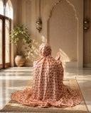 Peach floral lawn Namaz Chaadar with breathable fabric, elastic back head design, and wudu-friendly elastic sleeves for comfortable daily prayer.