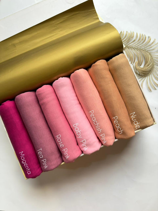 Plain jersey hijabs in Pink Shades and soft pastel shades arranged in a box