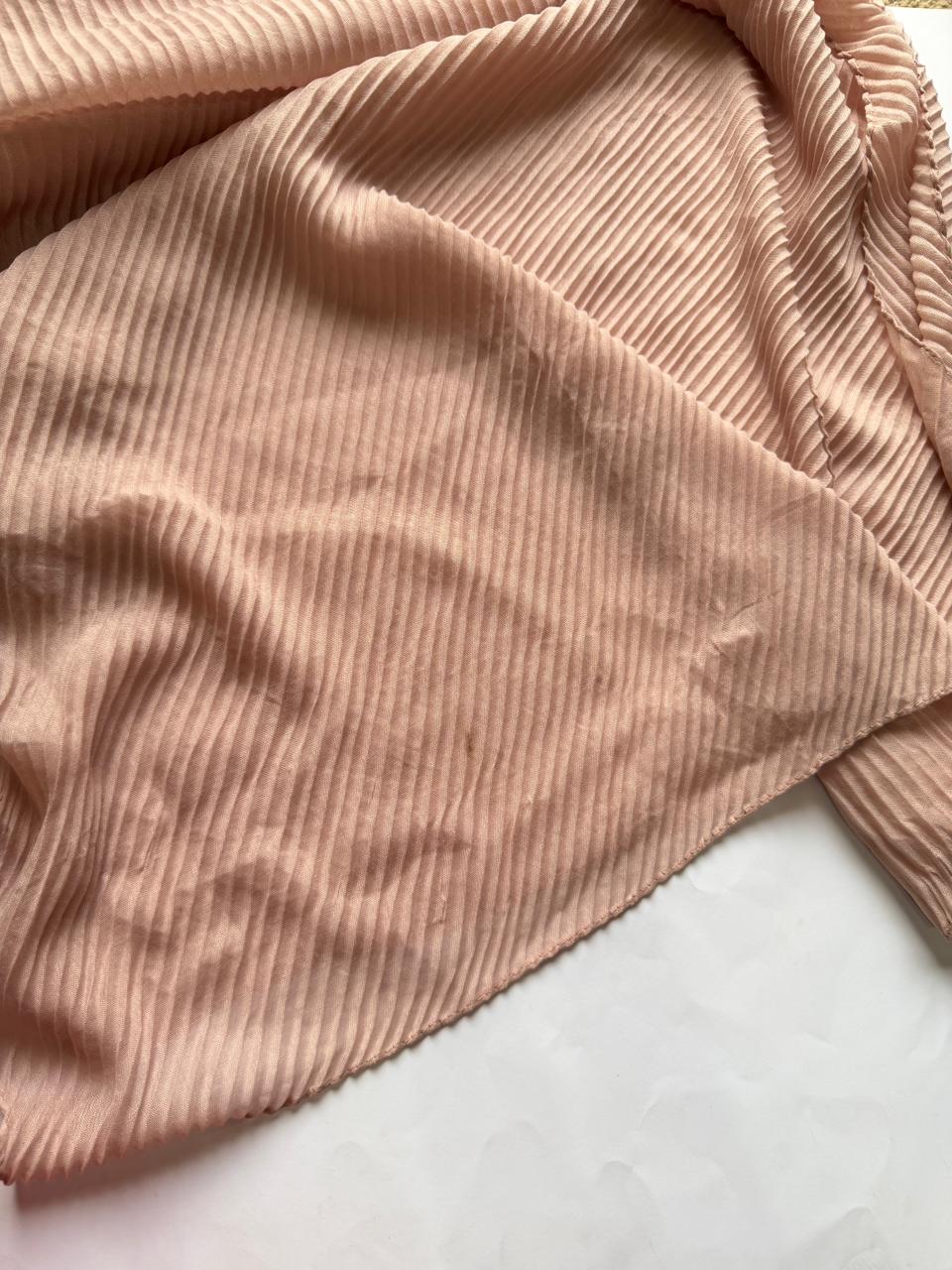 Powder Pink Bubble Pleated Lawn Hijab with slight stain, soft breathable lawn fabric and elegant pleated texture offered at a discounted price.