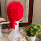 Red ruched tie back hijab cap made from soft breathable jersey with full head coverage and adjustable tie-back by Aynn Alif.