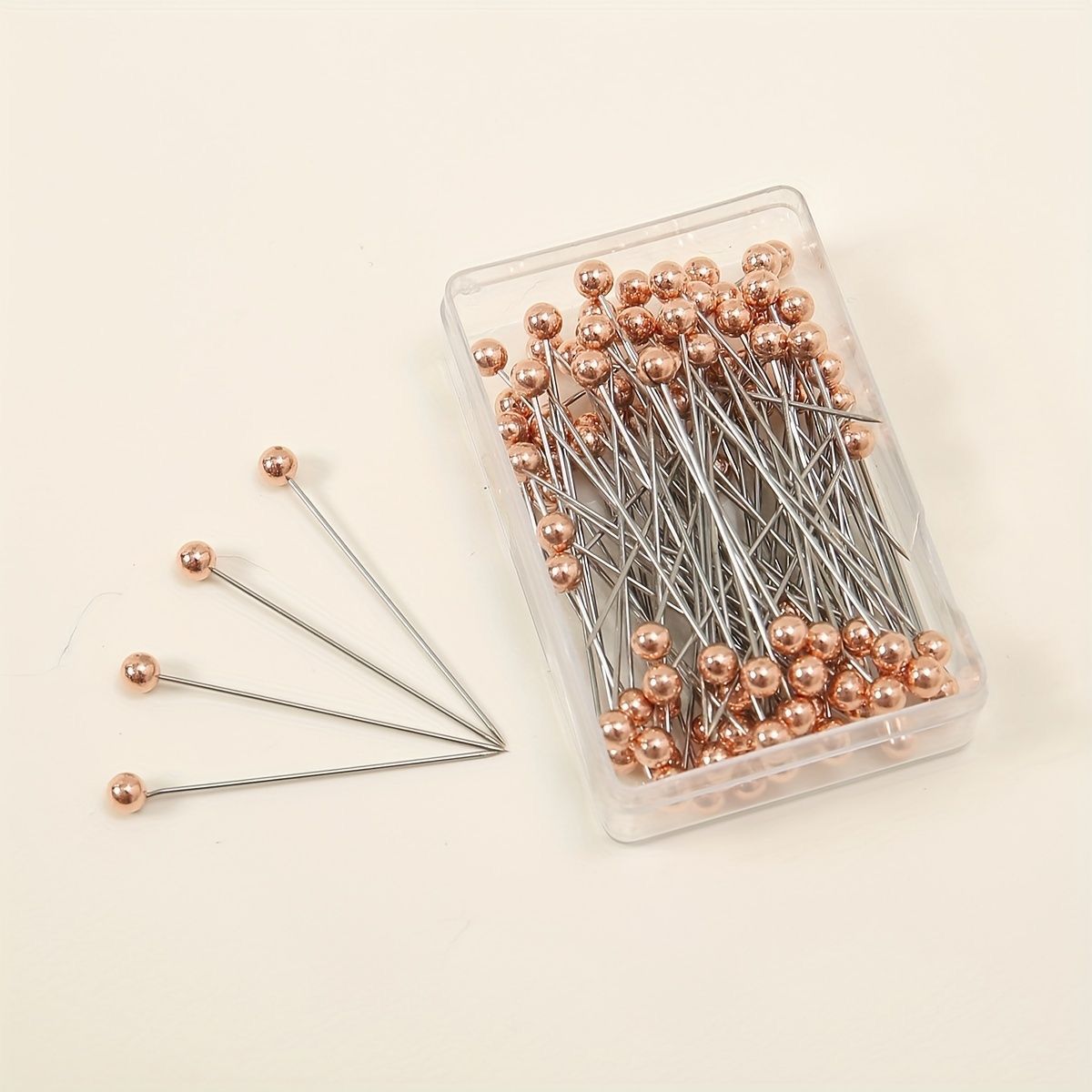Rose gold hijab pins box of 100 by Aynn Alif Pakistan featuring premium rose gold scarf pins for elegant hijab wear.