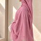 Rose pink modal hijab featuring extremely soft, breathable fabric, subtle texture, elegant draping, and an extra-large design by Aynn Alif.