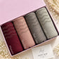 Stones studded ribbed jersey hijabs in Maroon, Tea Pink, Dark Grey and Light Grey, neatly rolled in a premium pink box.