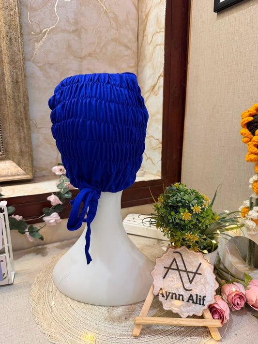 Royal Blue ruched tie back hijab cap made from soft breathable jersey with full head coverage and adjustable tie-back by Aynn Alif.