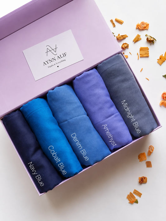 Aynn Alif Royal Blues Plain Lawn Tassel Hijab Set featuring Navy Blue, Cobalt Blue, Denim Blue, Amethyst and Midnight Blue with tassels at both ends.