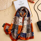Rust orange, navy and ivory printed silk scarf with abstract signature-style pattern by Aynn Alif