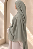 Sage green modal hijab by Aynn Alif in an extra-large size, featuring extremely soft, breathable fabric and an elegant drape