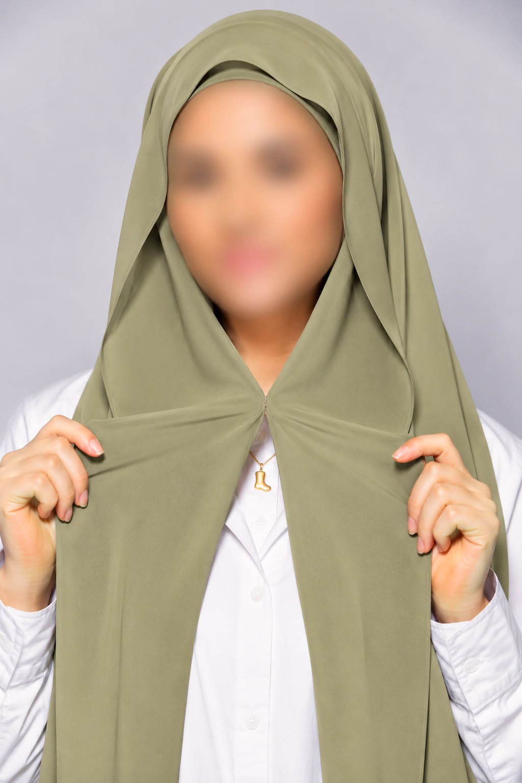 Sage green instant chiffon georgette hijab with attached tube band and built-in magnet for easy and effortless styling.