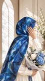 Aynn Alif Sapphire Waves printed sheen silk hijab in royal blue, sapphire, aqua and navy abstract wave pattern