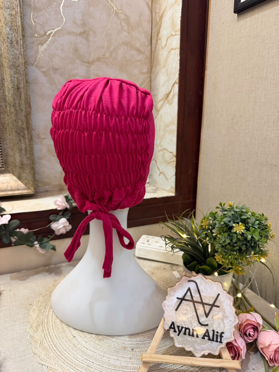Shocking Pink ruched tie back hijab cap made from soft breathable jersey with full head coverage and adjustable tie-back by Aynn Alif.
