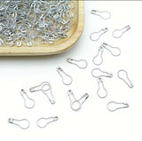 Silver Snag-Free Pear Pins for hijabs featuring a smooth coil-free pear-shaped design that glides through fabric without snagging or pulling.