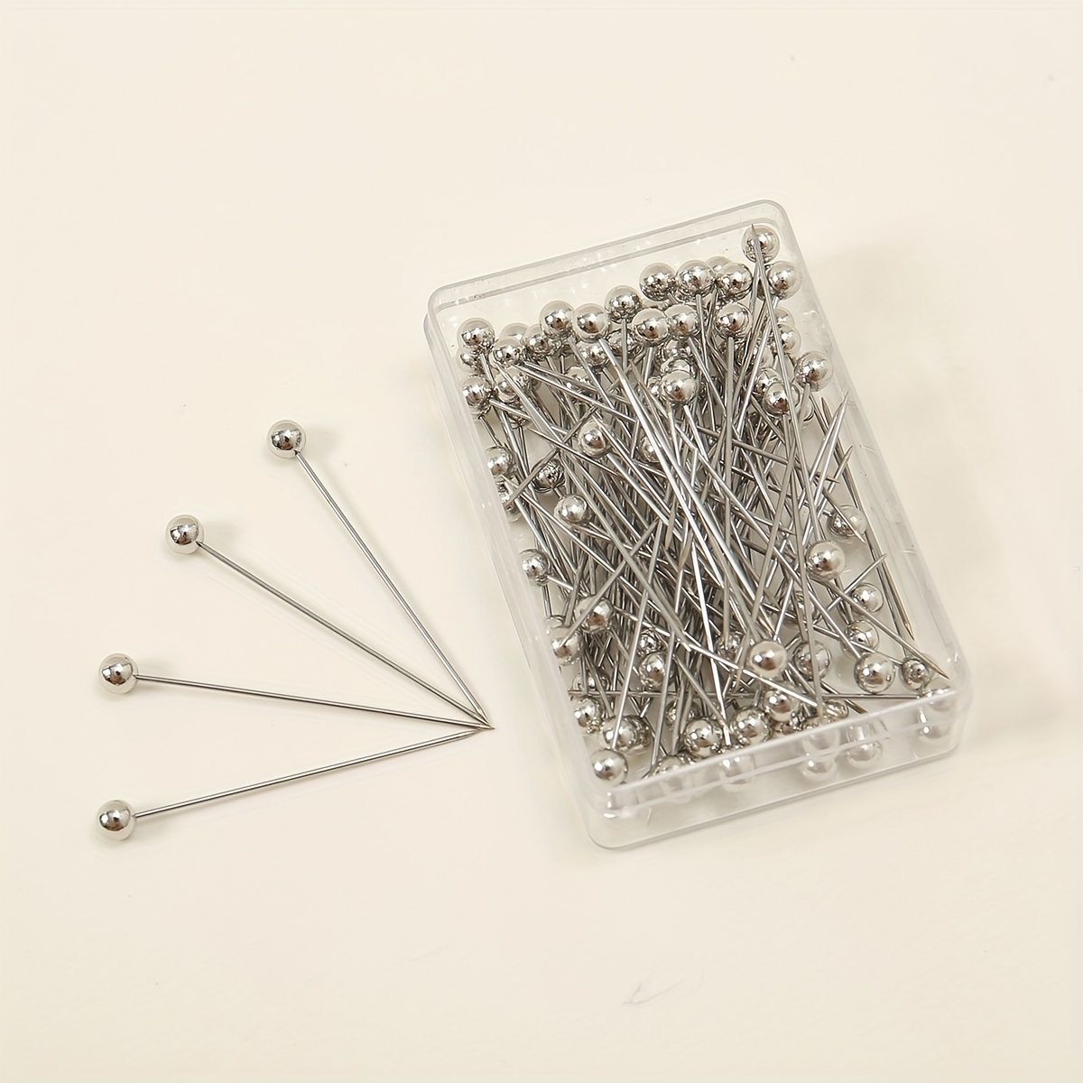 Silver hijab pins box of 100 by Aynn Alif Pakistan featuring premium silver scarf pins for stylish hijab wear.
